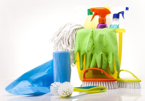 Detailed kitchen and cupboard cleaning during a move-in clean in Roehampton
